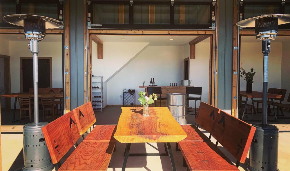 Patio and open rolling doors of the Kings North tasting room